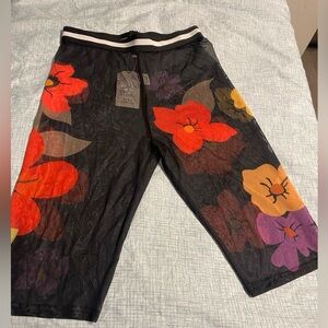 Sheer Black Floral Mesh Skirt with Bold Red Flowers